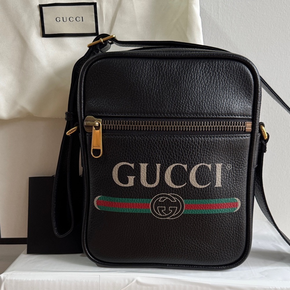 Gucci Black Leather Messenger Bag with Gold Accents